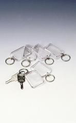  Nyckelbrickor med ring av glasklar plast 46x32mm